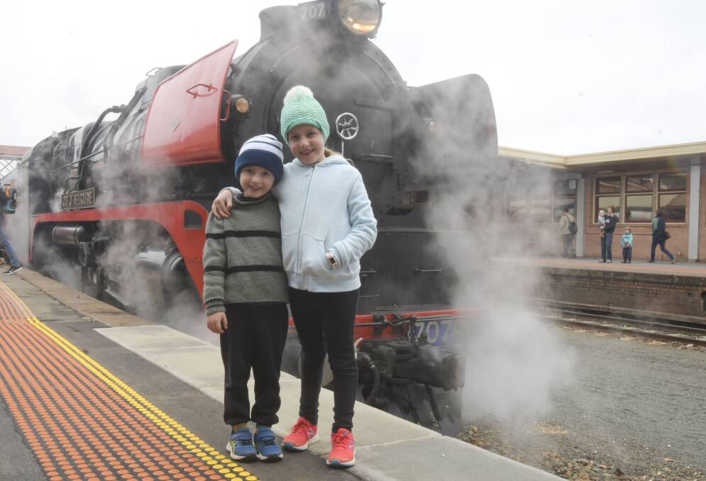 Nash and Lilly McMaster with the R707 steam locomotive at Bendigo Railway Station. Picture: NONI HYETT