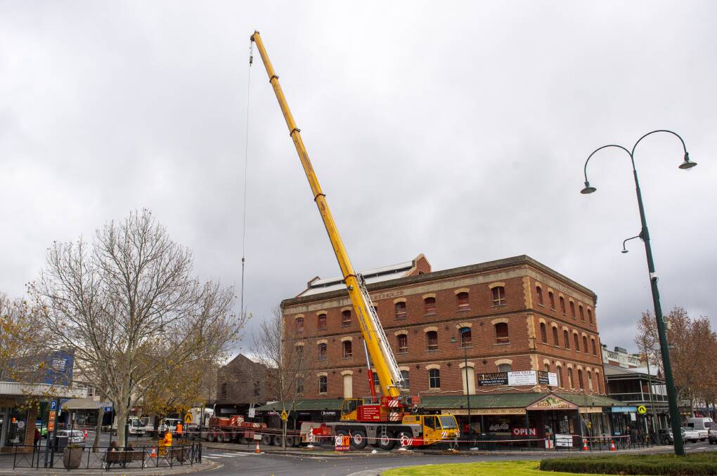 Roofing and the heating and cooling systems were installed at the Webb and Co building this week. Picture: DARREN HOWE