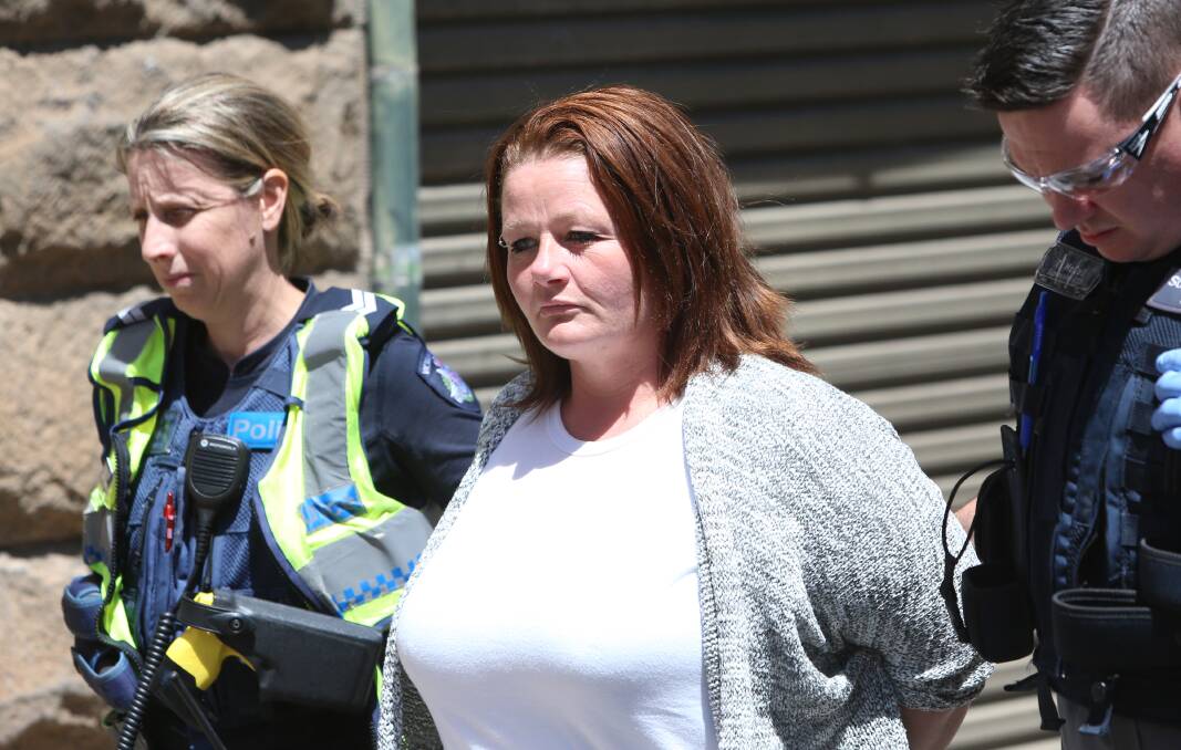 CHARGED: Kate Stone, 41, leaves the Supreme Court in Bendigo on Tuesday. She has pleaded not guilty to the 2016 murder of her partner Darren Reid.