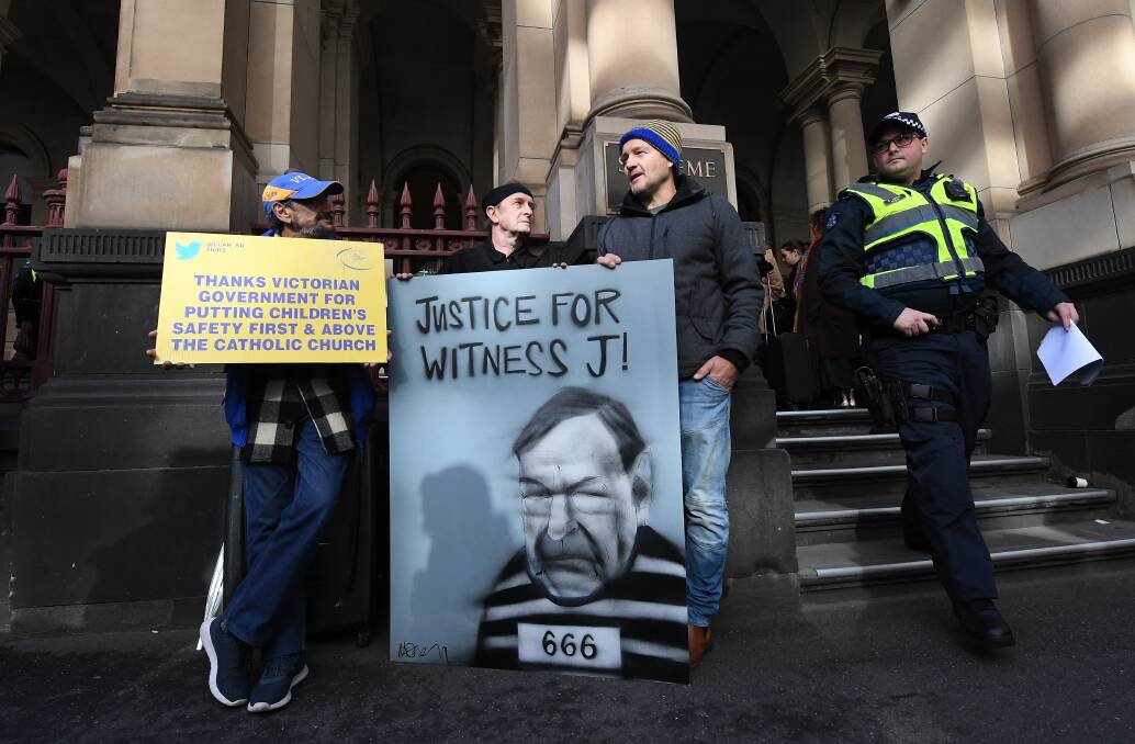 Supporters of sexual abuse victims outside the Supreme Court, where George Pell's appeal was dismissed. Picture: JULIAN SMITH 