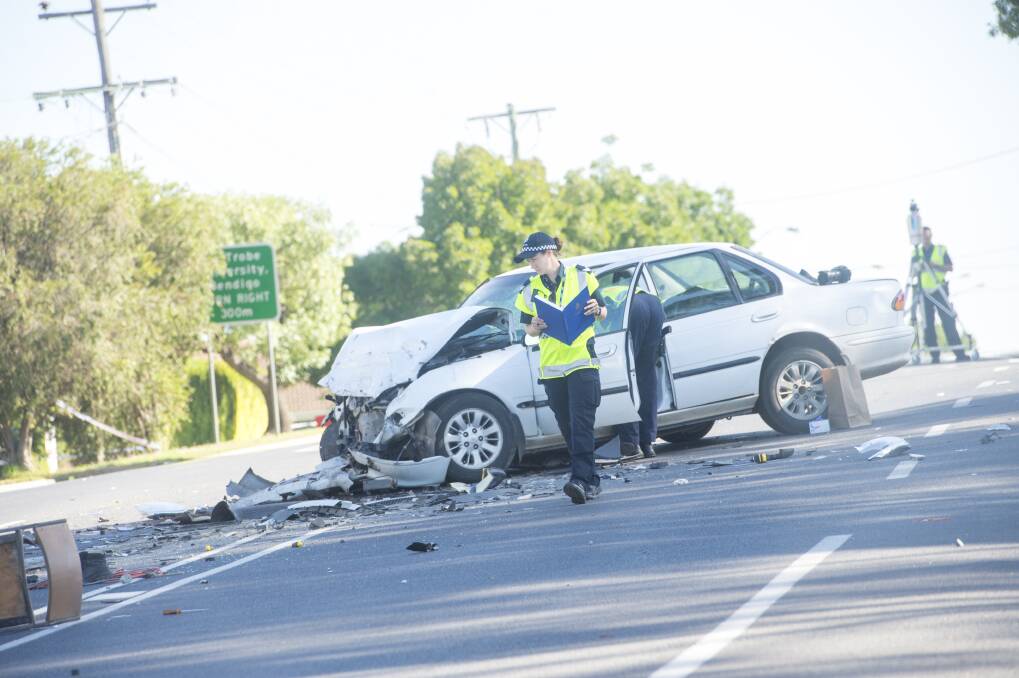 Police at the scene of the crash on Somerville Street, Flora Hill, last year. Picture: DARREN HOWE
