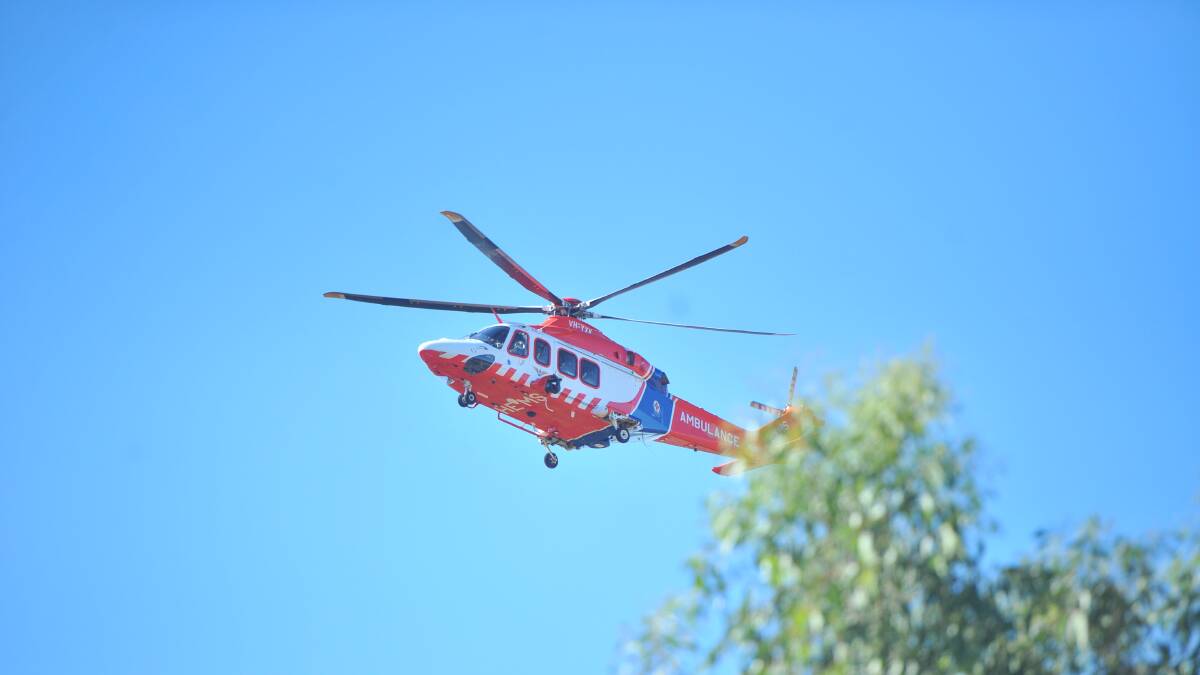 Man airlifted to hospital after motorcycle and car collide