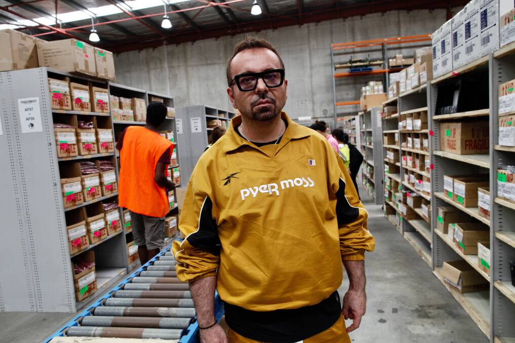 Napoleon Perdis in a company warehouse, after his company entered voluntary administration. Picture: DEAN SEWELL