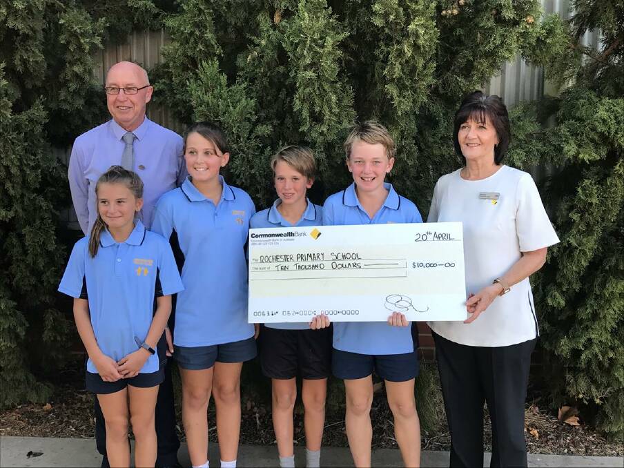 Rochester Primary School principal Graeme Hodgens and students Brooklyn Sparks, Rebecca Pearce, Blake Roulston and Nate Rasmussen with Commonwealth Bank Rochester branch manager Shirley Penny.
