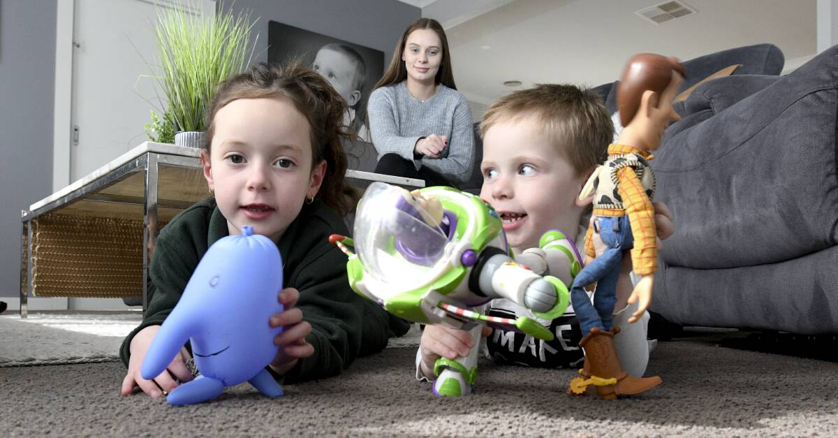 BARRIER: Telisha Begg has found the cost has made it difficult to get child care for her children Imigene Brown and Logan Moyle. Picture: NONI HYETT
