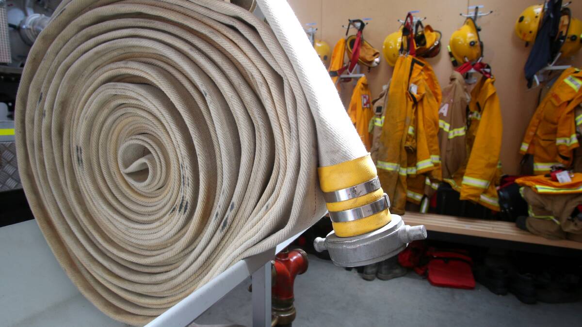 Firefighters battle hay shed blaze