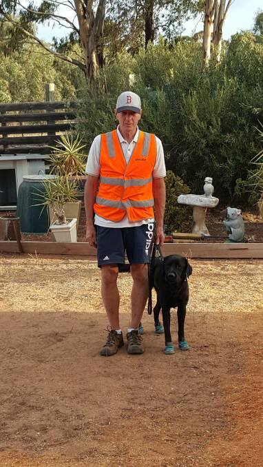 Ray Meadows and his guide dog, Gerry. Picture: SUPPLIED