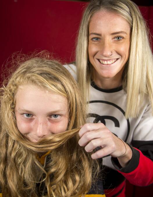 Gus Hay and Tahnee Cannan ahead of Gus' big shave. Picture: DARREN HOWE