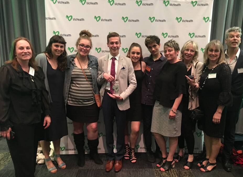 Macedon Ranges Shire mayor Janet Pearce, left, with Live4Life crew members and staff and Youth Live4Life Inc. board members at the VicHealth awards.