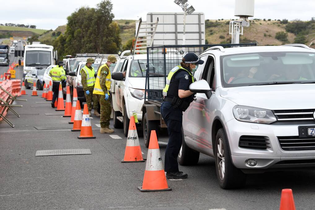 TEAMWORK: Police and the Australian Defence Force have worked together at the checkpoint. Photo: Kate Healy