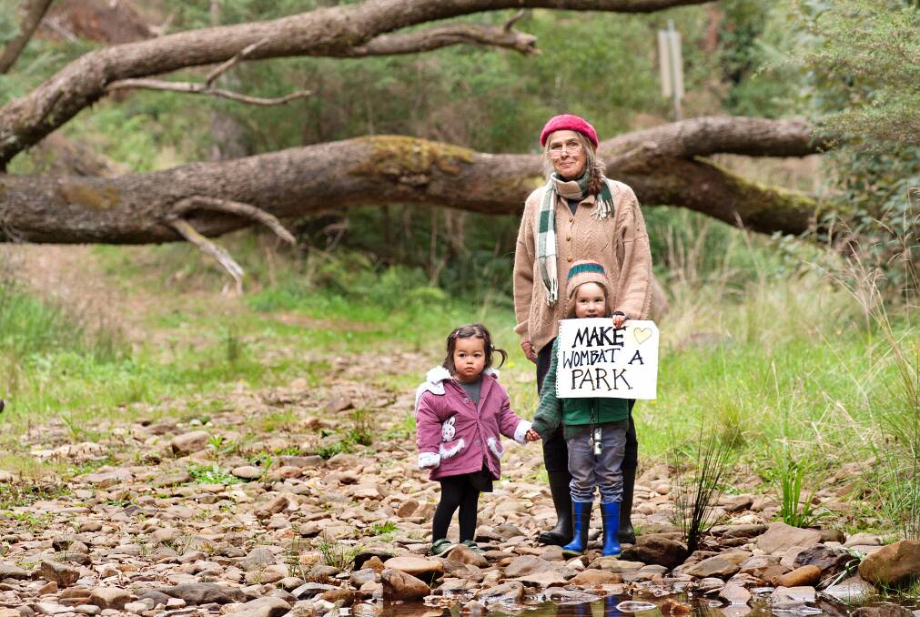 Marg Rowell, pictured with her grandson and grandniece, hopes to see the
forest protected. Picture: Sandy Scheltema