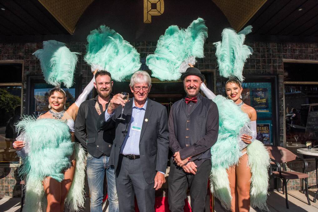RIBBON CUT: Mayor Don Henderson with Brendan Wykes, Richard Fanale and showgirls at the official opening. Picture: BRENDAN McCARTHY