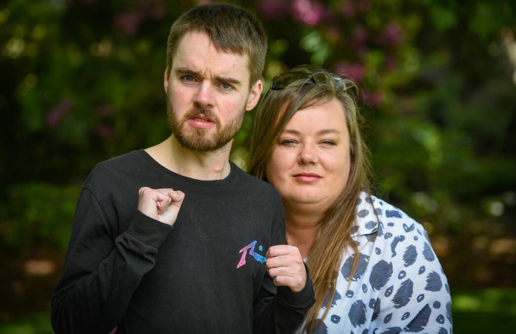 CARE: Jeremy Bester, 27, with mother Lyn Cleaver, who says many Tasmanians are resorting to unregulated cannabis products for medical treatment. Picture: Paul Scambler 