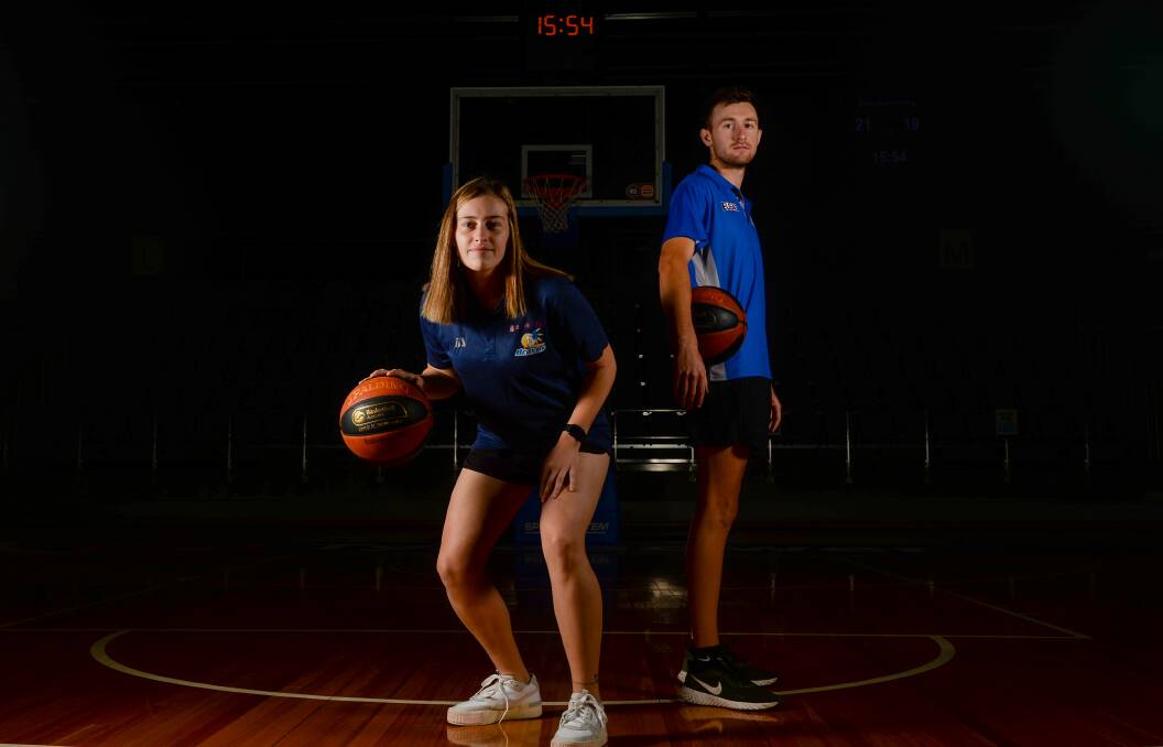 DUAL-CODE ATHLETE: Sharna Appleby with Jack White ahead of the Bendigo Braves' CBL teams' grand final appearances in March this year. Picture: DARREN HOWE