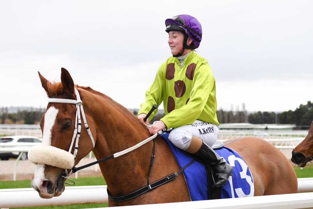 DEPENDABLE: Alana Kelly returns to the mounting yard on Hot Seat after their win on the Ballarat synthetic in July this year. Picture: REG RYAN/RACING PHOTOS