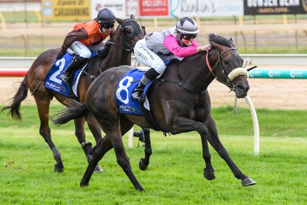 Atomic Selfie, ridden by Hannah Edgley, surges to victory at Bendigo as Hay Cliffy (Hannah Le Blanc) runs on well for second. Picture: BRETT HOLBURT/RACING PHOTOS