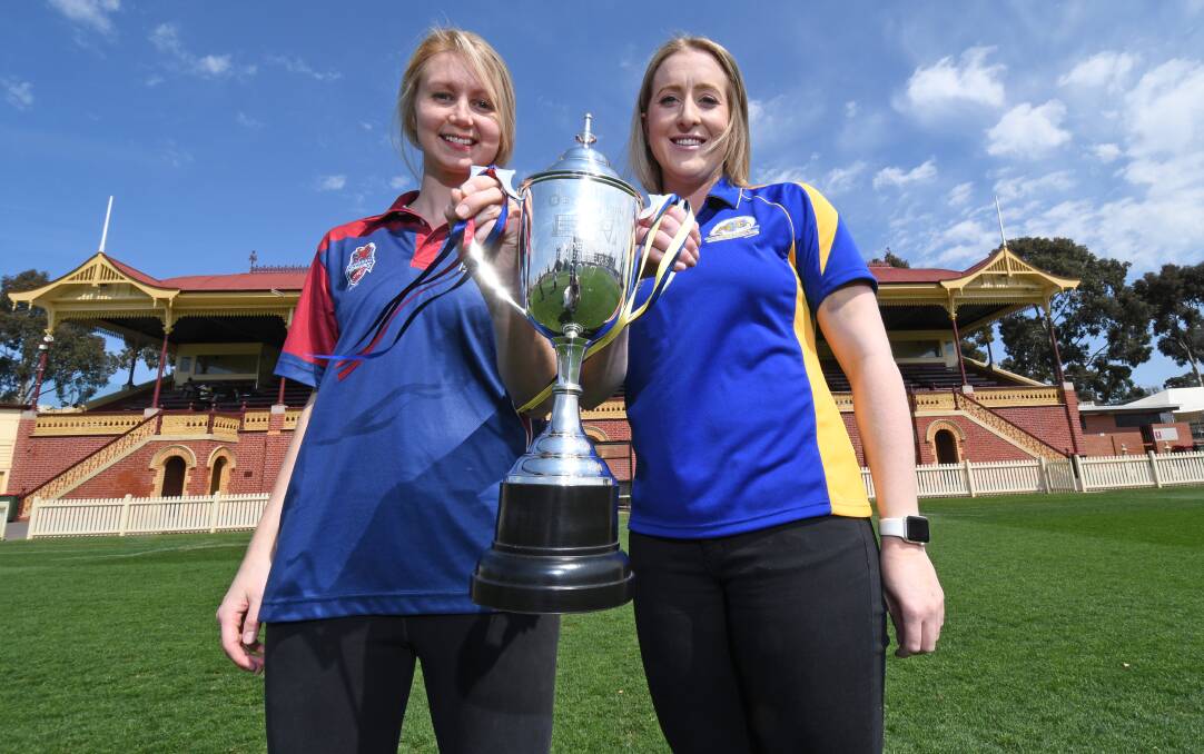 Allira Holmes with Sandhurst's joint coach Heather Oliver ahead of the 2017 BFNL A-grade grand final. Picture: DARREN HOWE