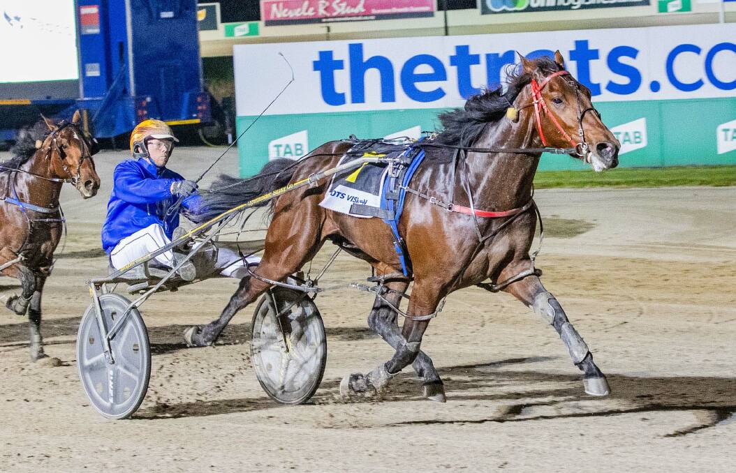 Jack Laugher steers Mister Hunter to victory in the $150,000 APG Vic Gold Bullion 2YO Colts and Geldings Final at Tabcorp Park Melton on Saturday night. It was the 23-year-old driver's first Group 1 success. Picture: STUART McCORMICK