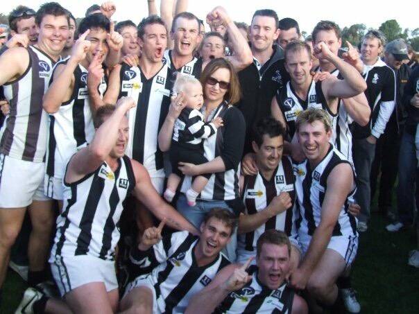 Boort players and supportersd celebrate an emotional2008 premiership success.