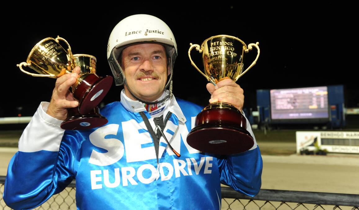 Trotting legend Lance Justice is pictured following Smoken Up's win in the 2011 Bendigo Pacing Cup at Lord's Raceway. Justice, who has more than 3000 career wins, will be in action in the Veteran Driver’s Trot this Friday.