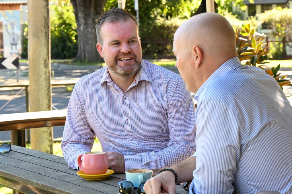 New Bendigo Jockey Club chief executive officer Paul Scullie and departing CEO Rob Heinjus chat over coffee in Bendigo this week. Picture by Darren Howe