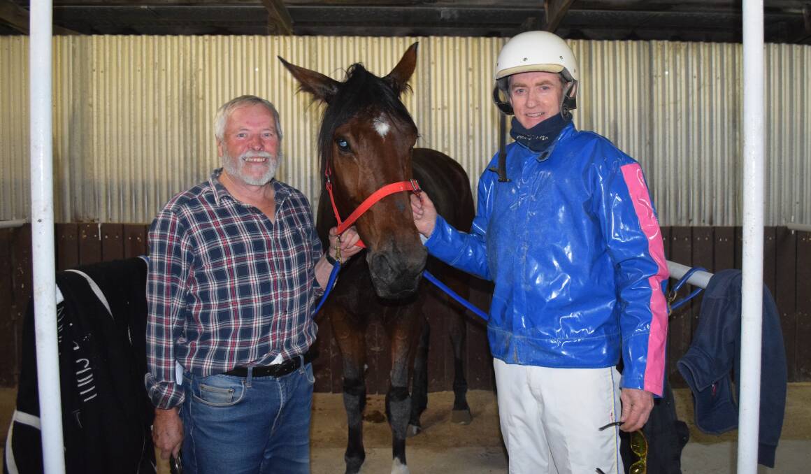 Lockwood trainer Jim Grant and driver Ron Wicks with Yankee Twister following the five-year-old trotter's maiden win at Lord's Raceway last Friday night. Picture: KIERAN ILES