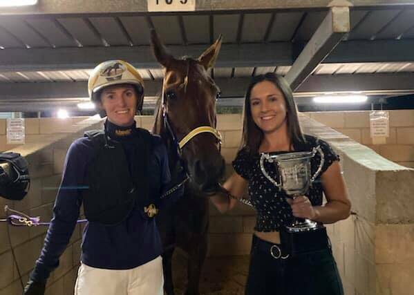 Ellen Tormey and Kate Hargreaves celebrate their Mildura Trotters Cup win with Well Defined.