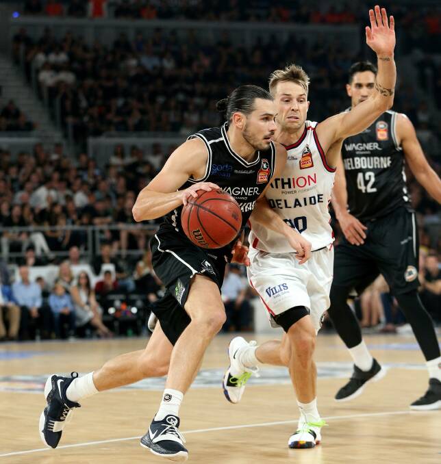 BENDIGO-BOUND: Melbourne United's Chris Goulding drives against Nathan Sobey of Adelaide 36ers during game five of the NBL finals earlier this year. Picture: AAP IMAGES