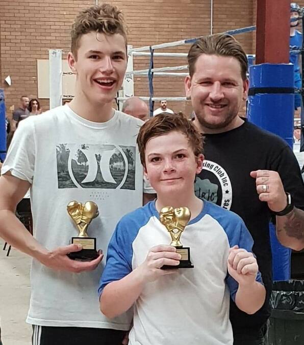 Bendigo boxing coach Danniel Burton with his Golden Gloves winners Tynan Waugh and Sammy Kay. Picture contributed.