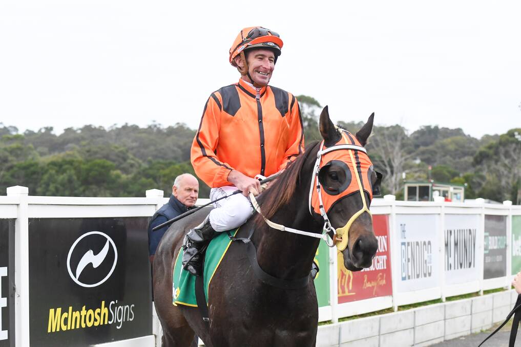 John Keating returns to the mounting yard after his win aboard Steady Jam for Tatura trainer Brendan Clements on Thursday. Picture: PAT SCALA/RACING PHOTOS