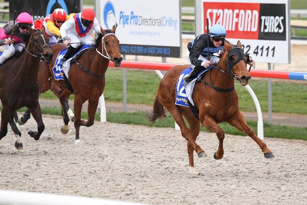 Paris Gem, ridden by Will Price, wins the Sportsbet's Footy Fill Up Benchmark 58 Handicap at Ballarat Synthetic on Tuesday. Picture: PAT SCALA/RACING PHOTOS