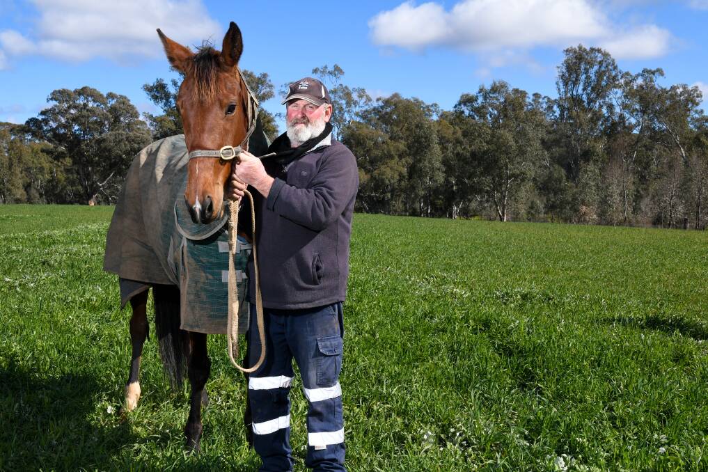 PROUD: Glenn Sharp with his ultra-consistent mare and dual award winner Mystic Chip at Longlea. Picture: NONI HYETT