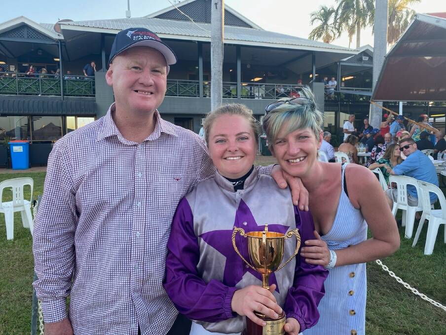 Jessie Philpot celebrates her thrilling win in the 2021 Darwin Cup with her former bosses, Kyneton's Mick and Mel Sell. 