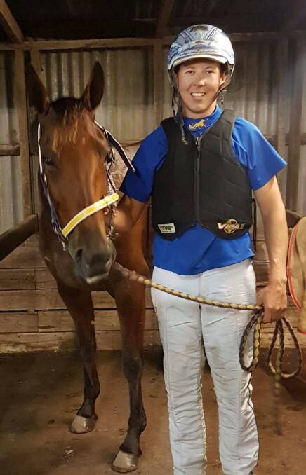 Alex Ashwood and Well Defined after Tuesday night's thrilling Group 3 win at Terang. Picture: TERANG HARNESS RACING CLUB