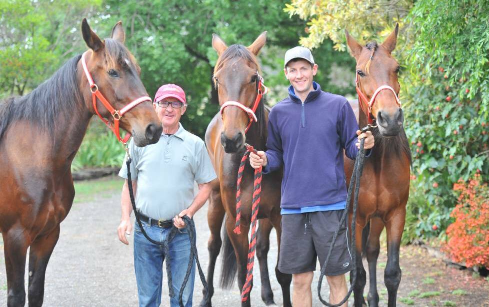 Trainer Chris Svanosio and father Peter with trotting trio Magicool, Kyvalley Finn and Norquay, after their treble at Tabcorp Park Melton last Saturday night. Picture: KIERAN ILES