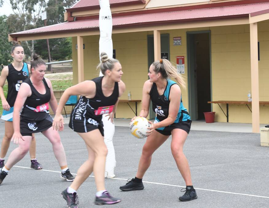Jordan Macilwain in action for Maryborough this season against Castlemaine, alongside her goaling partner Keely Hare. Picture: ANTHONY PINDA