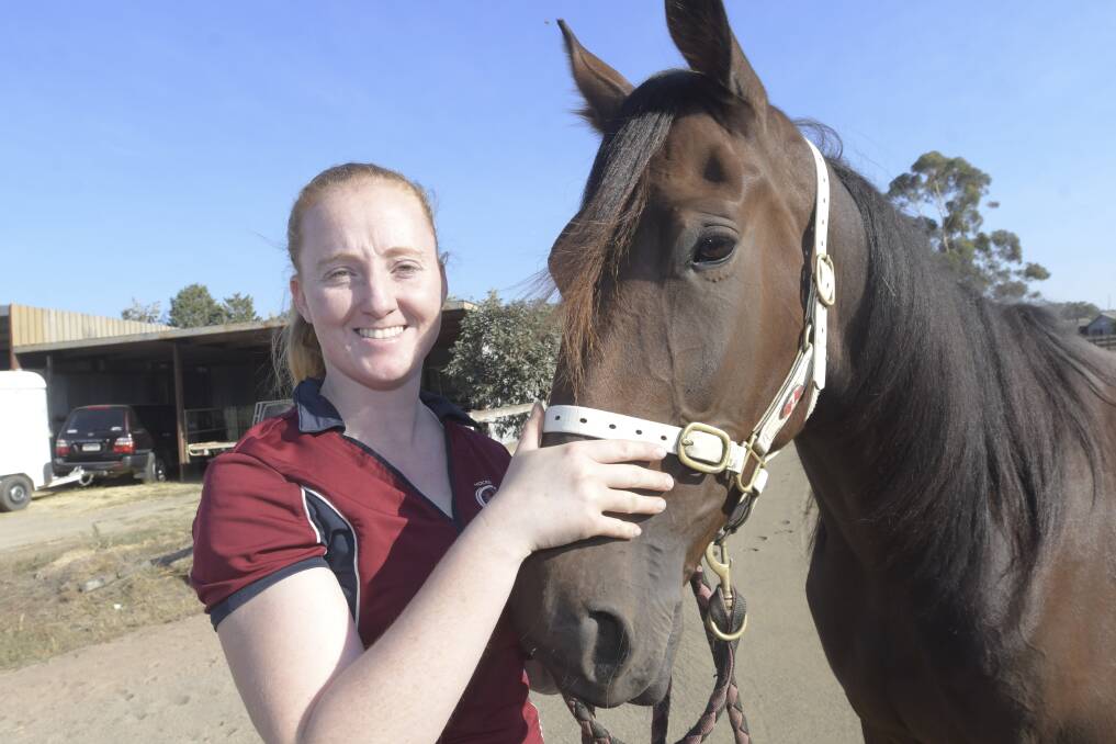 Tarah Youngson with the Brad Stevens-trained Endsin A Party, who won the Mildura Trotters Cup last Thursday. Picture: NONI HYETT