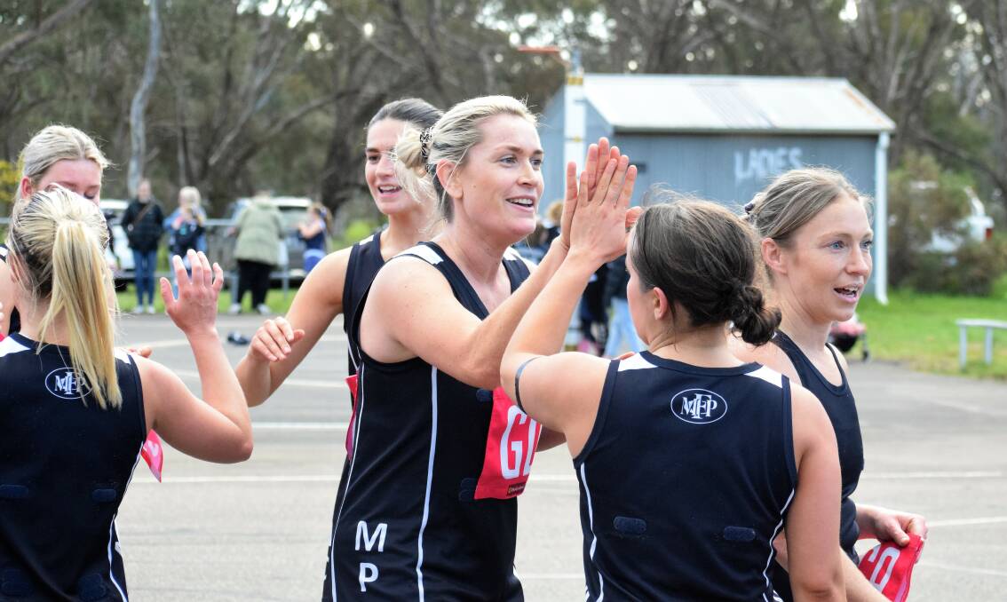 Job done: Mount Pleasant players high five after sealing a HDFNL finals berth with their round 18 win over Lockington-Bamawm United. Picture by Kieran Iles