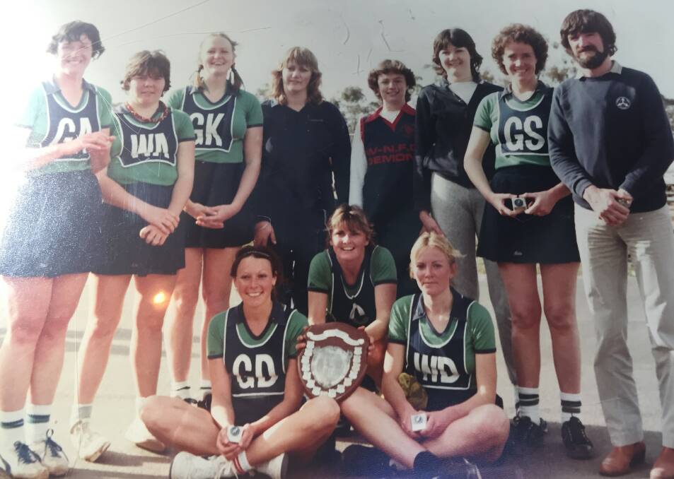 Wycheproof-Narraport's 1983 premiership team, coached by Des Hearn. Rhonda Allan is pictured with the shield.
