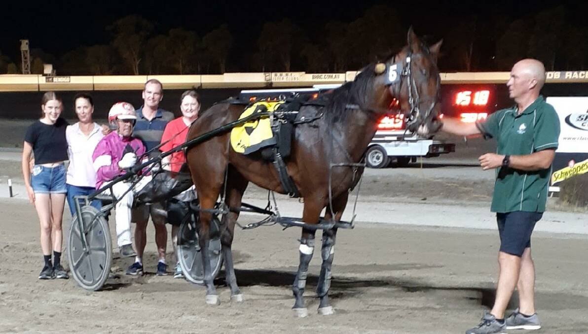 Belittled's connections celebrate the gelding's track record-setting win at Lord's Raceway on Thursday night.