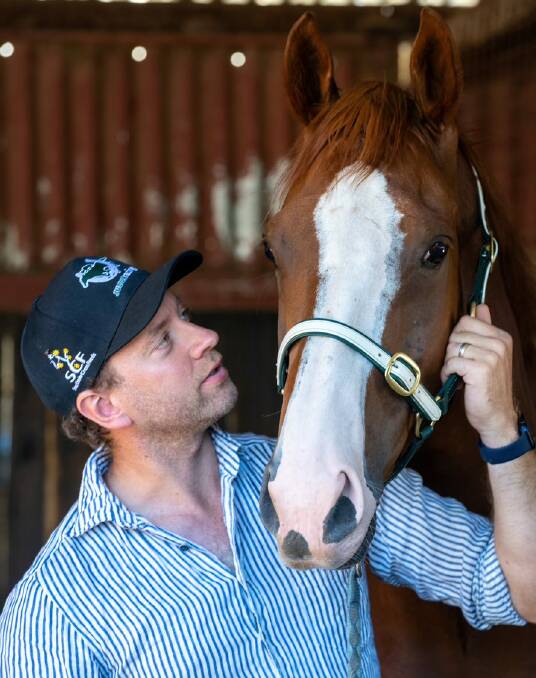 Josh Julius with his stable star Just Folk. Picture: RACING PHOTOS