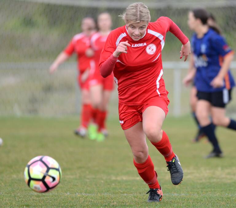 GOAL SCORER: Nicole Ford chases a loose ball for Spring Gully United. Picture: GLENN DANIELS