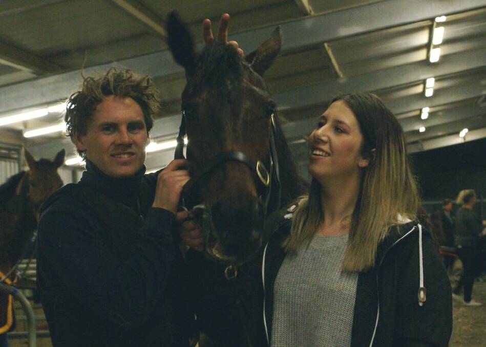 Haydon Gray and Maddie Ray with Miranda Kay are all smiles after the mare's first win.