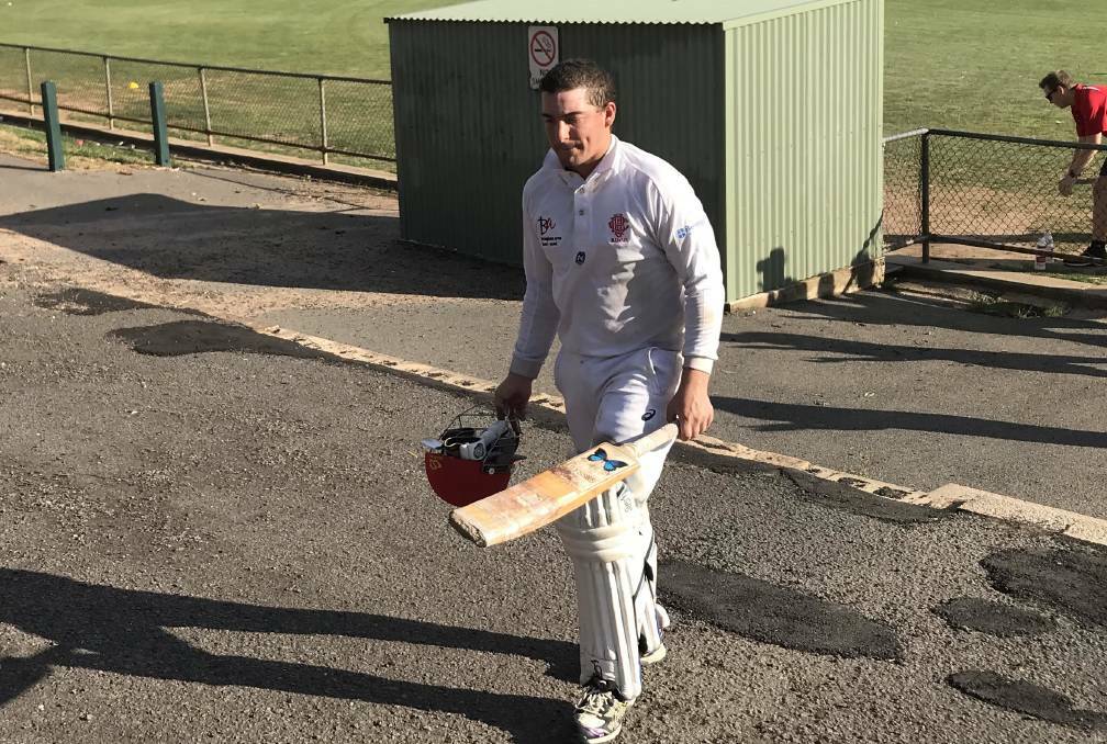 Bendigo United's Jake Klemm makes his way back to the Harry Trott Oval changerooms after his 201 against White Hills in November. Picture: LUKE WEST