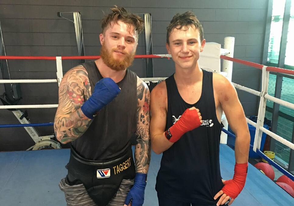 Jake May (right) is bound for the Golden Gloves tournament in New Zealand. The three-time state champion has been sparring three-times a week with fellow Bendigo boxer Danny Taggart.