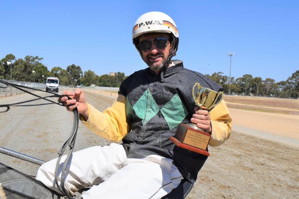 WIN MAKES TWO: Peter Sanderson celebrates his second Elmore Trotters Cup win with Scottish Sardius. Picture: KIERAN ILES