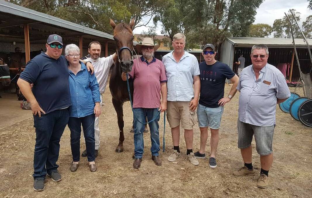 Inglewood trainer Trevor Ralph with the driver Peter Sanderson and connections of Angels Breath.