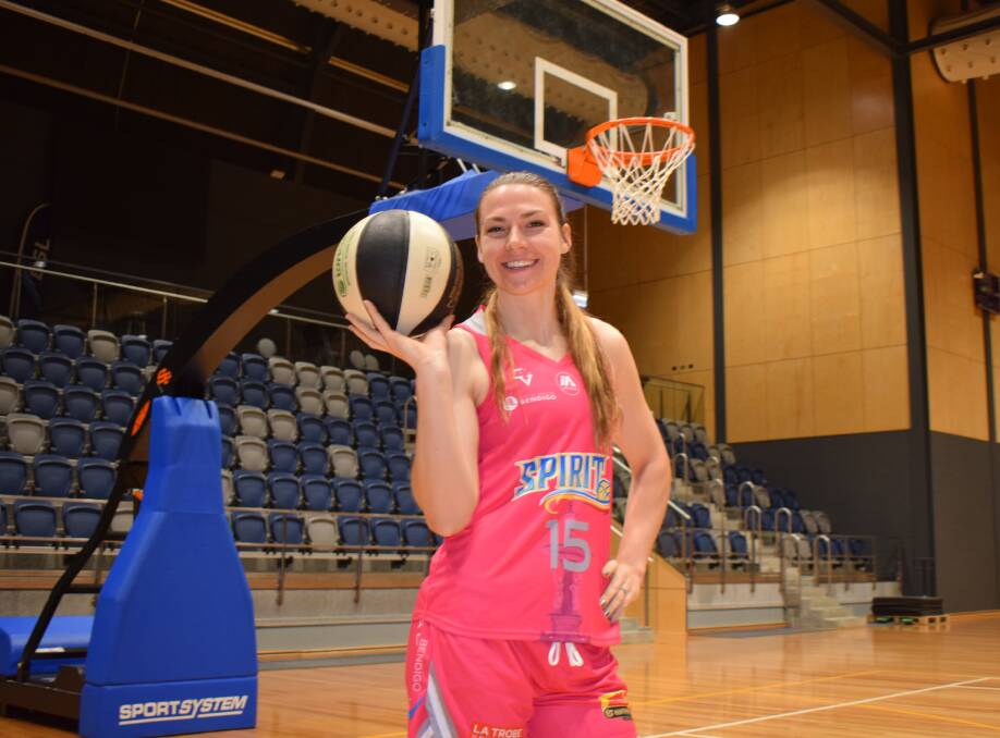 GLAD TO BE BACK: American Teige Morrell is determined to make the most of her second short stint in the WNBL with Bendigo Spirit. The Spirit will wear pink jerseys this Saturday night to raise breast cancer awareness. Picture: KIERAN ILES