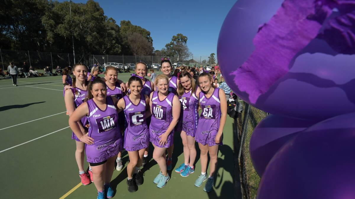 Heathcote Football Netball Club went purple for the Georgia Edsall-French Memorial Game against Huntly on Saturday. Pictured is the Saints' winning B-grade team, which defeated Huntly 39-21. Picture: NONI HYETT