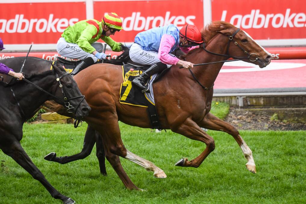 ANOTHER PATH: Just Folk, ridden by John Allen wins the Crystal Mile at Moonee Valley in October last year. Picture: BRETT HOLBURT/RACING PHOTOS
